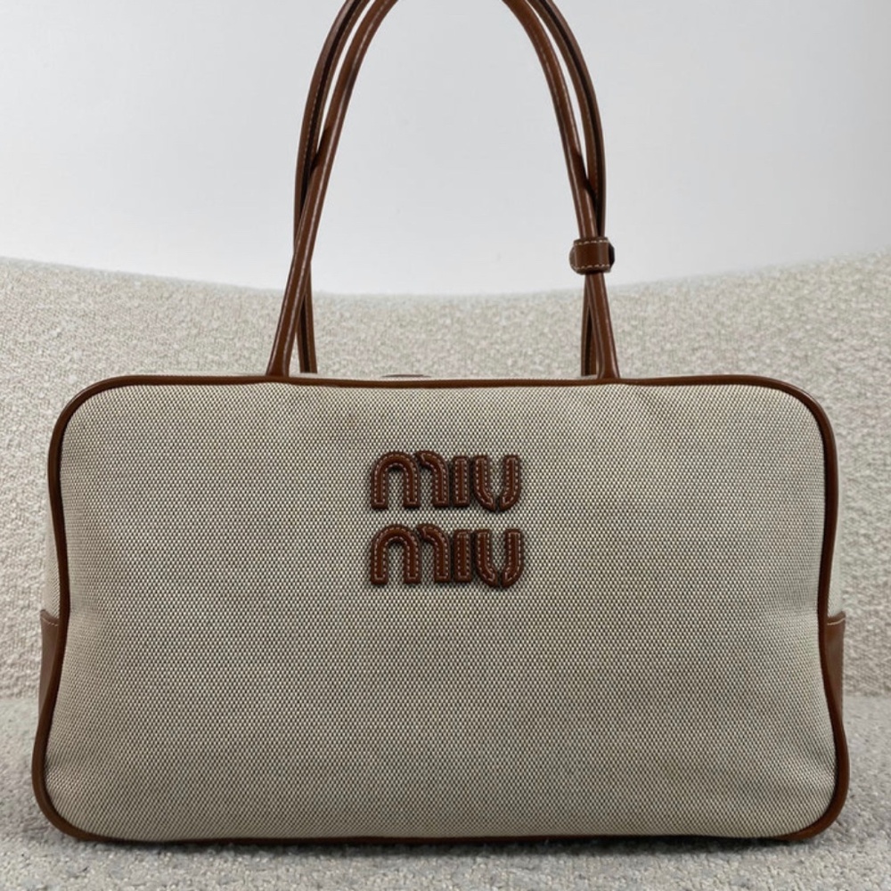 Authentic Pre-Owned Miu Miu Logo leather-trimmed canvas tote bag